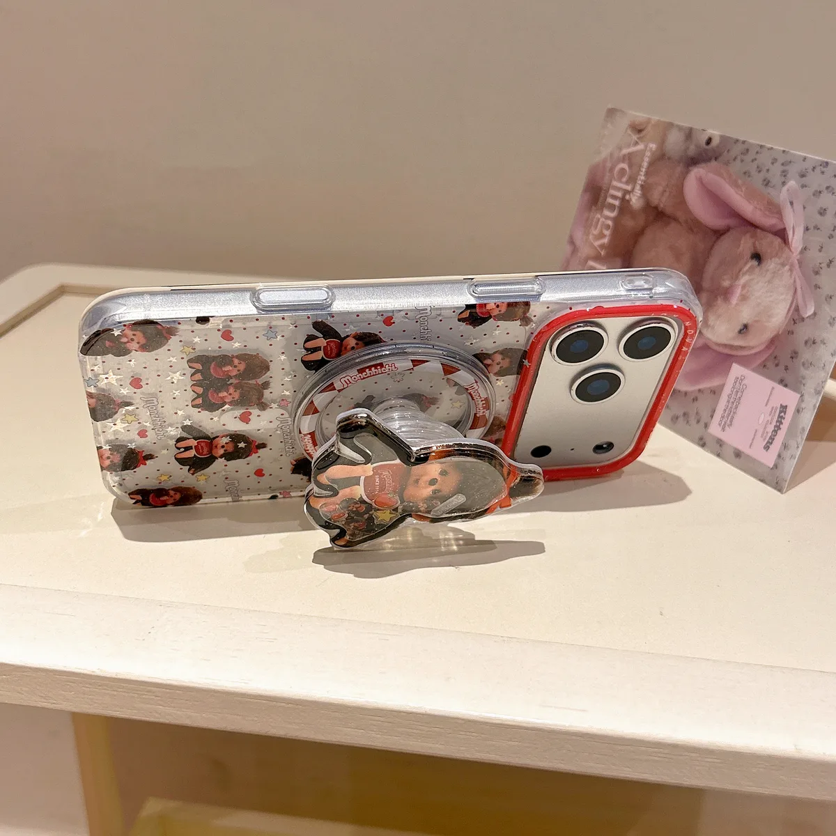 Monchhichi Clear Glitter Fill Red Rim With 3D Charm Phone Case for iPhone 17 16 15 14 13 Pro Max — MagSafe